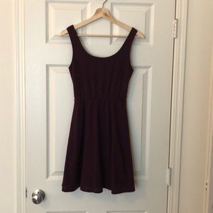 An adorable plum, a-line textured dress.